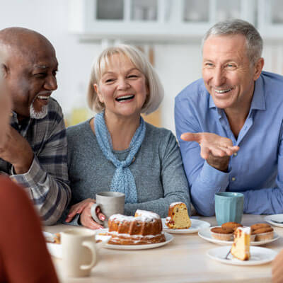 Group Of Elders At Table